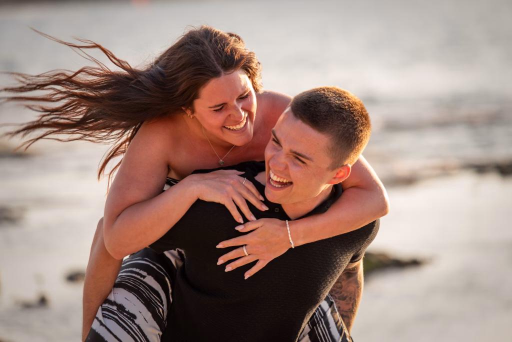 Couple having fun during a beach couple photoshoot in Naxos